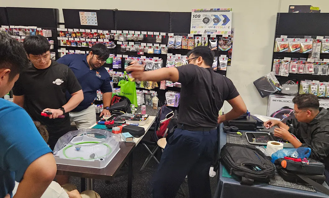 A beginner Beyblade X starter set featuring the Xtreme Stadium and Takara Tomy launchers at The Playground Hobby Store Singapore.