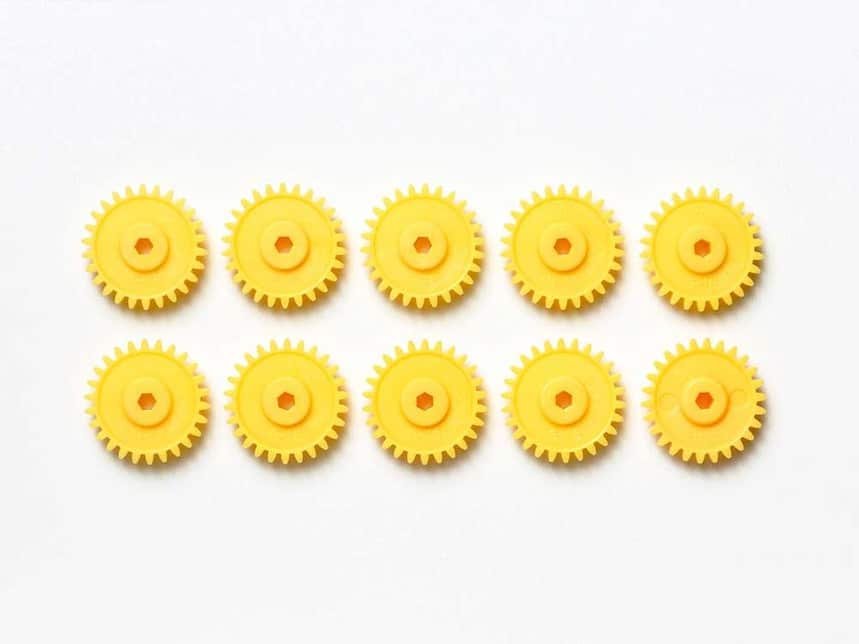 10312.jpg Tamiya AO-1041 10312 1/32 MINI 4WD G-18 GEAR(YELLOW/10PCS) - Image 1