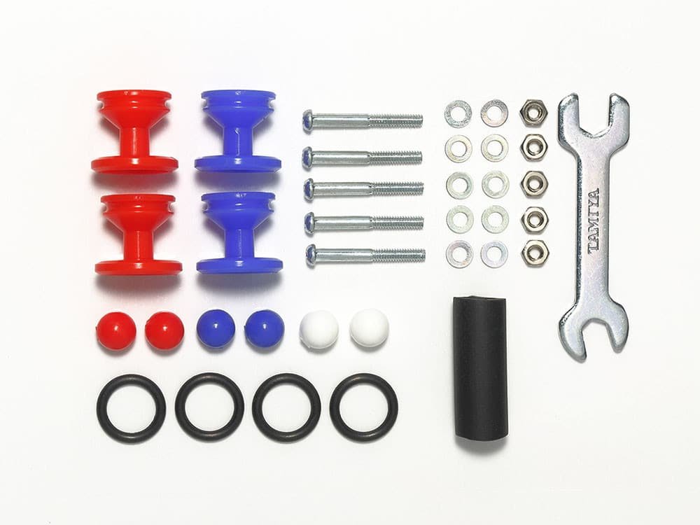 15525_1.jpg Tamiya 15525 1/32 Mini 4WD LOW FRICTION PLASTIC DOUBLE ROLLERS w/RUBBER RINGS (RED & BLUE/13-12mm) - Image 1