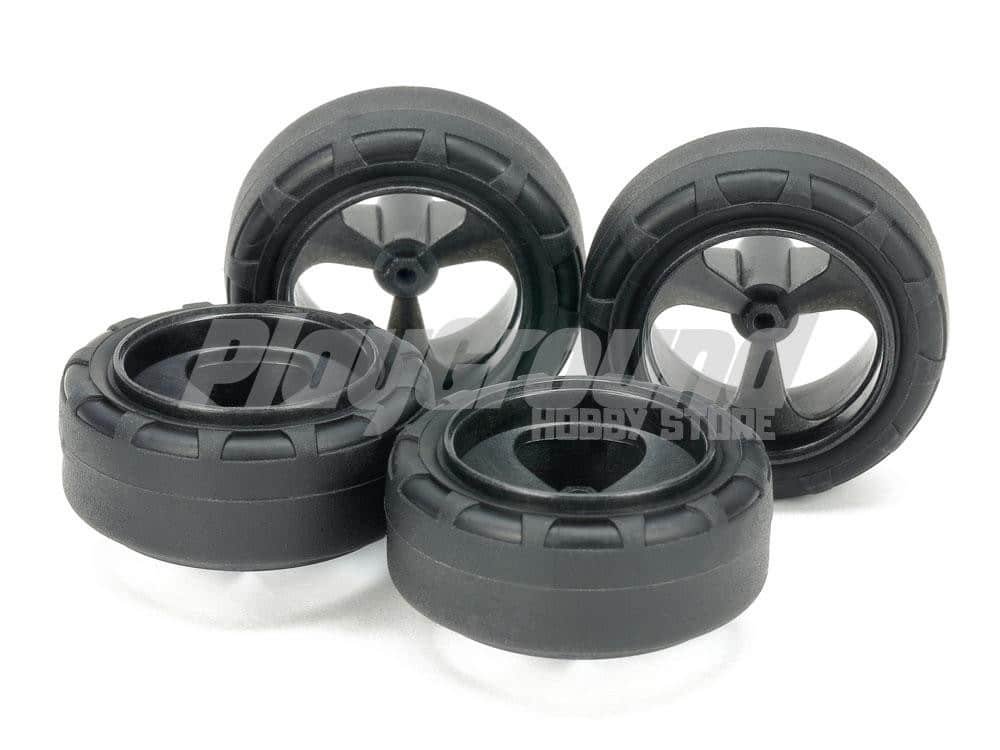 95635-1.jpg TAMIYA 1/32 MINI 4WD 95635 SUPER HARD SMALL DIA. NARROW TIRES (24MM) & REINFORCED 3-SPOKE WHEELS - Image 1