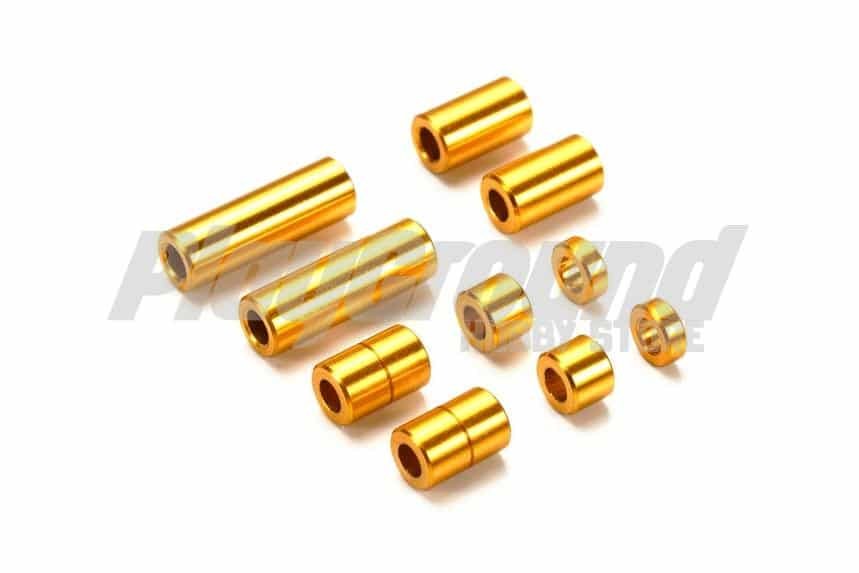 d5ccaf6a3b0aaeed1fe8f0c14e078942-1.jpg Tamiya 95442 1/32 Mini 4WD Aluminum Spacer Set (12/6.7/6/3/1.5mm, 2pcs. each) (Gold) - Image 1